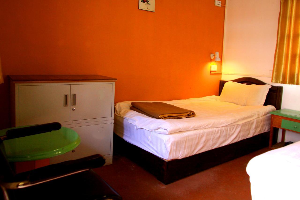 Shangri-La Lao Shay Youth Hostel Екстериор снимка